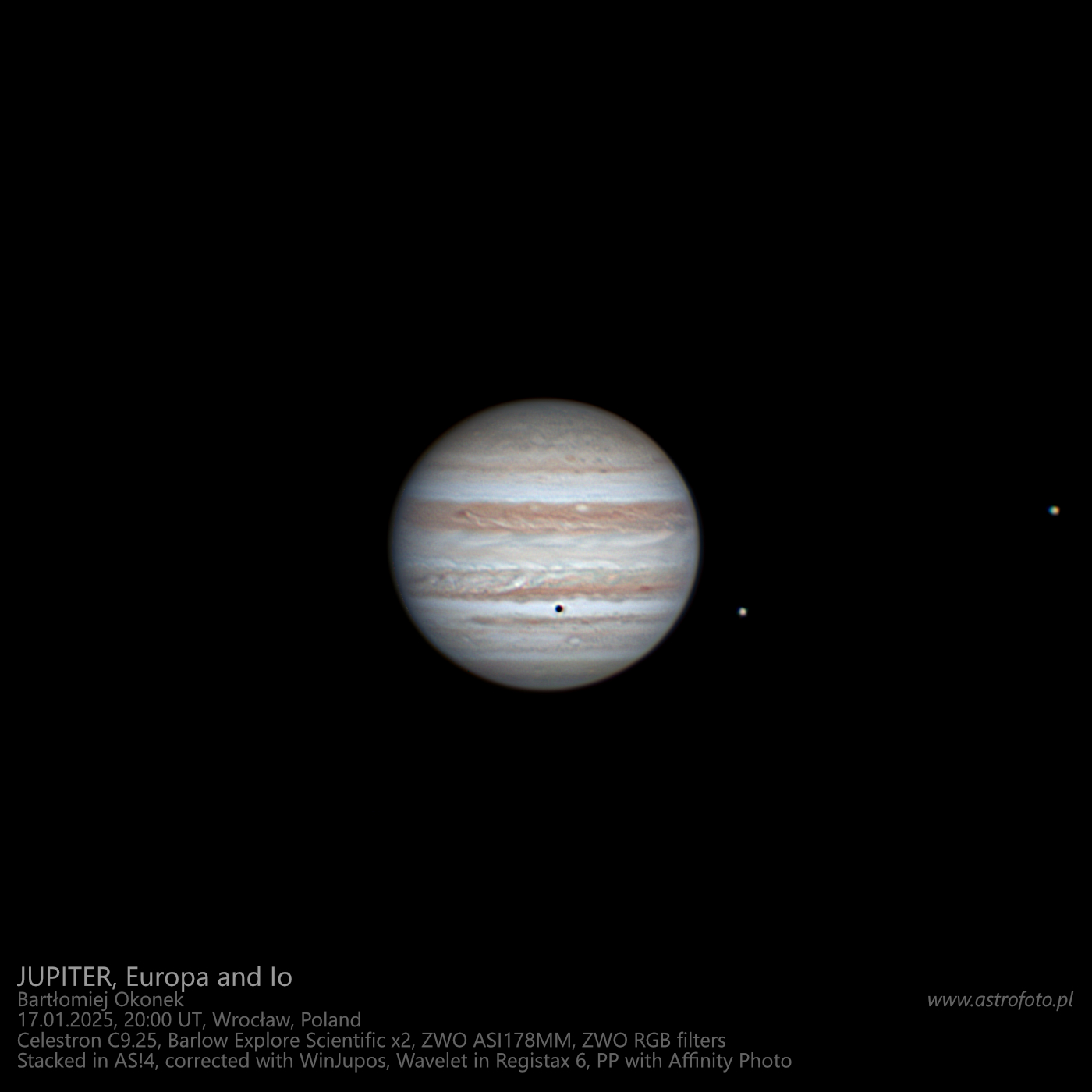 Jupiter, Europa and Io. Europa casts its shadow.